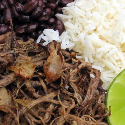 Vaca Frita served with rice, black beans, plantains